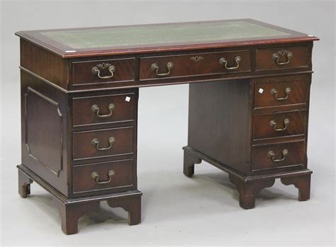 A Late 20th Century Reproduction Mahogany Twin Pedestal Desk Fitted