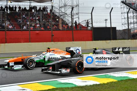 Esteban Gutierrez Mex Sauber C And Adrian Sutil Ger Force India