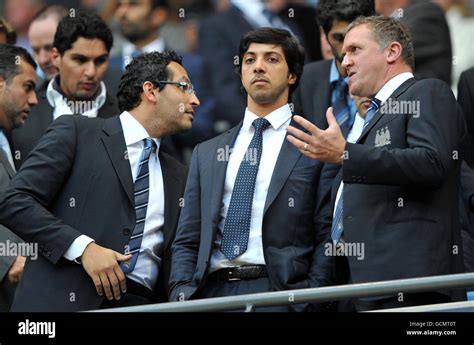 Manchester City owner Sheikh Mansour (centre) with chairman Khaldoon Al ...