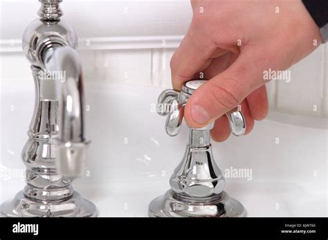 Hand Turning Tap Stock Photos Hand Turning Tap Stock Images Alamy