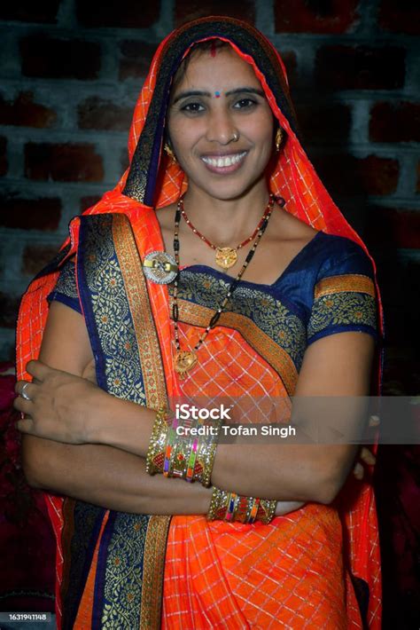 Indian Rural Women In Traditional Clothes Beautiful Women In Orange