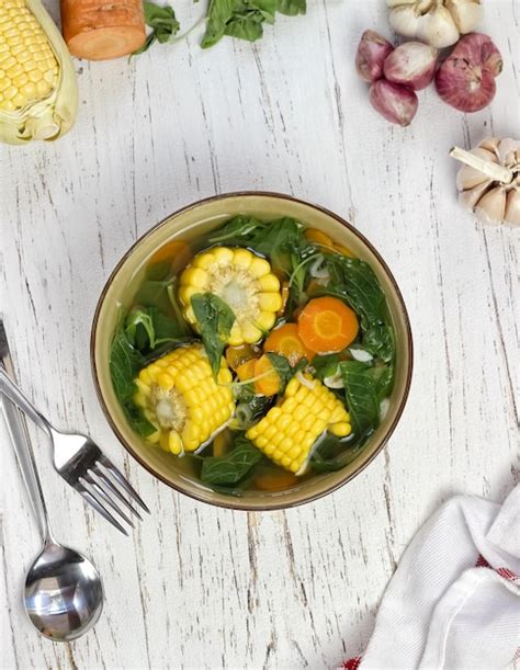 Premium Photo | Sayur bening bayam or spinach clear soup is Indonesian food made from some ...