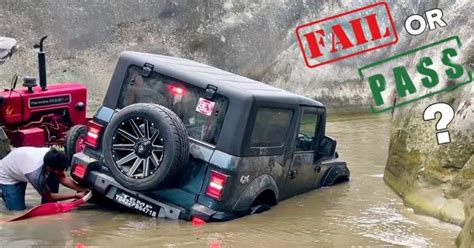 Mahindra Thar gets stuck in river sand; Rescued by tractor