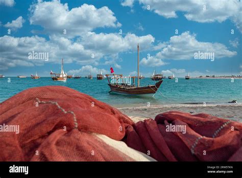 Dhow wooden boat maker. constructing dhow boat. Dhow Festival Doha Stock Photo - Alamy