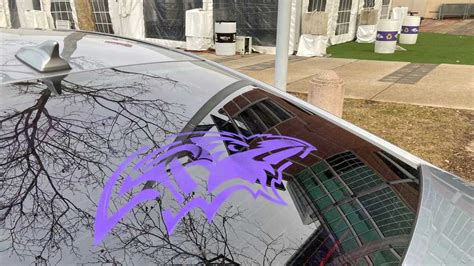 Ravens stencil team logo across Baltimore ahead of playoffs