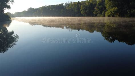 Beautiful Lake Landscape with a Forest Reflection on the Water Stock ...