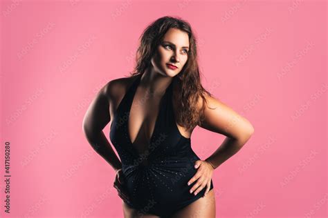 Sexy Plus Size Fashion Model In Black One Piece Swimsuit Fat Woman In Lingerie On Pink