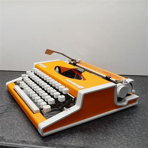 Orange Olympia Traveller Deluxe Typewriter Free Shipping