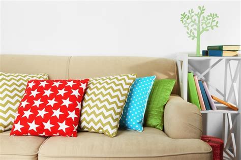 Premium Photo | Colorful pillows on sofa closeup