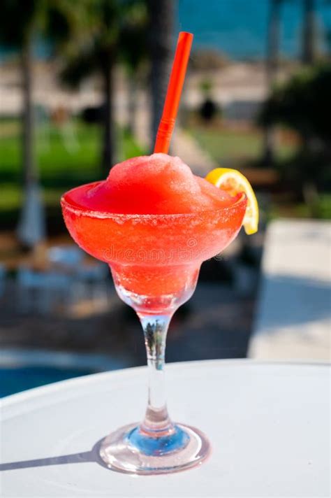 Colourful Cold Strawberry Daiquiri Cocktail Drink Served In Glass At