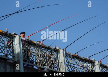 Fishermen on Galata Bridge in Istanbul Turkey Stock Photo - Alamy