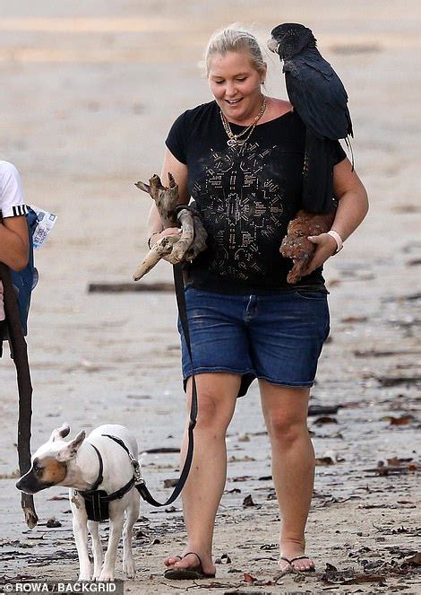 Epstein S Sex Slave Virginia Roberts Gathers Driftwood On A Beach In Australia Daily Mail Online