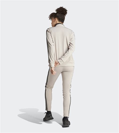 Buy Adidas Essentials 3 Stripes Tracksuit In Beige 6thstreet Qatar