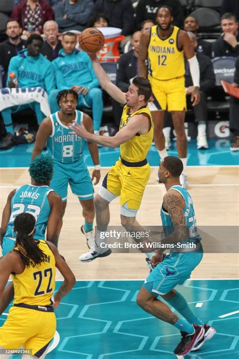 T J Mcconnell Of The Indiana Pacers Goes To The Basket During The