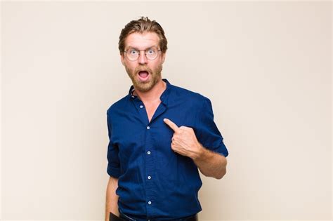 Premium Photo Blonde Adult Blonde Man Wearing Glasses Isolated