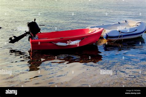 Inflatable dinghy outboard motor hi-res stock photography and images - Alamy