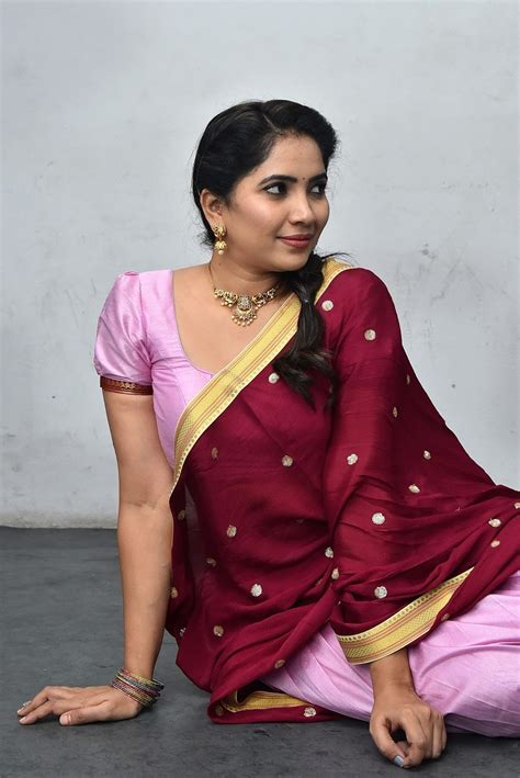 Anchor Indu Hot Stills In Half Saree