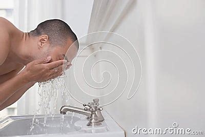 Man Washing Face In Sink Royalty Free Stock Photography Image 29656977