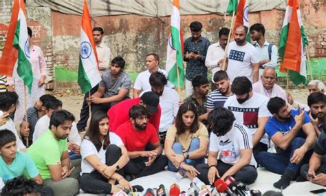 Indian Wrestlers Vinesh Bajrang And Sakshi Resume Protest Against