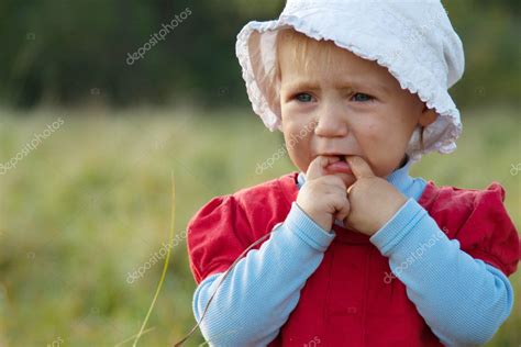 Sad Baby Girl Crying Outdoors — Stock Photo © Fajnokg 7129178