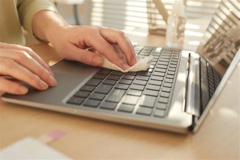 How To Clean A Laptop Keyboard Without Removing The Keys Sparkling Penny