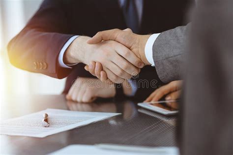 Handshake As Successful Negotiation Ending Close Up Unknown Business People Shaking Hands