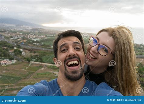 Joyful Interracial Heterosexual Couple Husband And Wife Take A Selfie