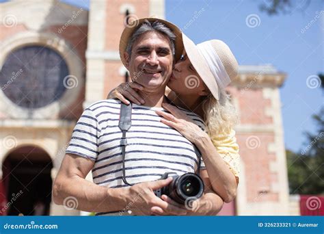 Mature Woman Kissing Man On Holiday Stock Image Image Of 5060