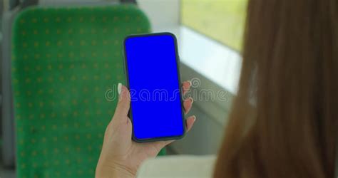 Close Up Of A Woman Hand Holding A Mobile Telephone With A Vertical