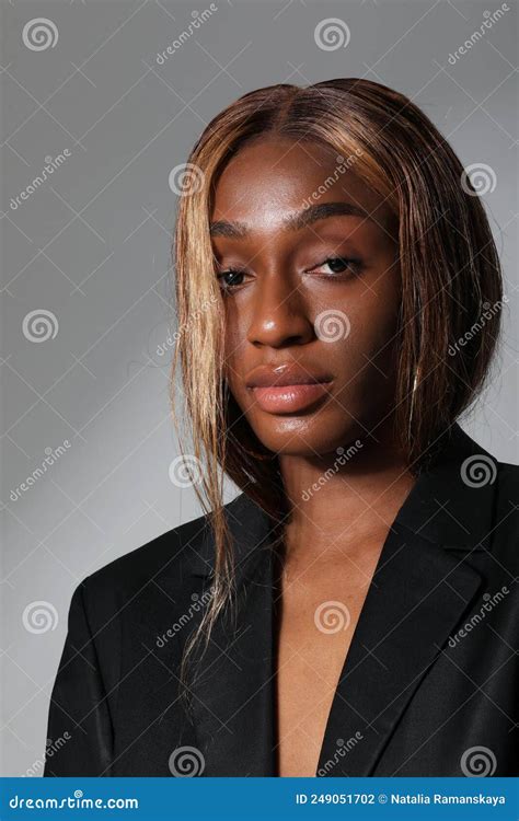 Portrait Of Beauty Woman In Body Suit Posing And Showing Perfect Body