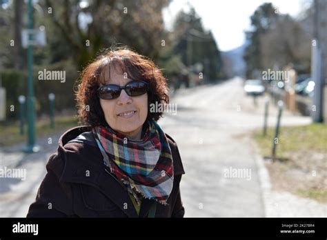 Portrait Of Beautiful Mature Brunette With Sunglasses Stock Photo Alamy