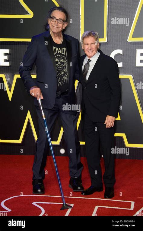 Peter Mayhew And Harrison Ford Poses For Photographers Upon Arrival At