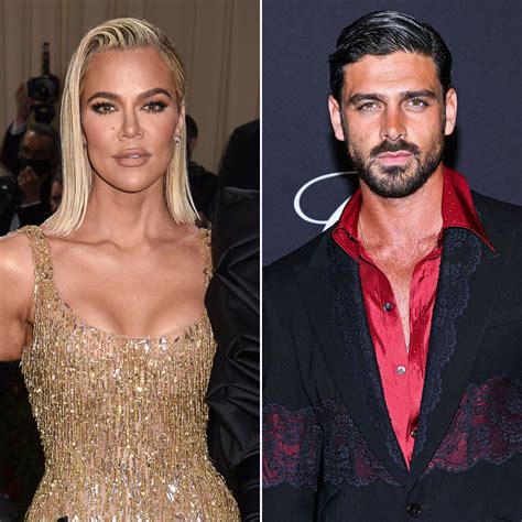 Khloe Kardashian, 365 Days' Michele Morrone Hug at Fashion Show | Us Weekly