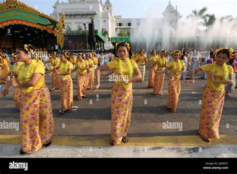 Yangon, Myanmar. 13th Apr, 2022. Dancers perform during the water
