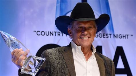 George Strait honoured at CMA Awards | CBC News