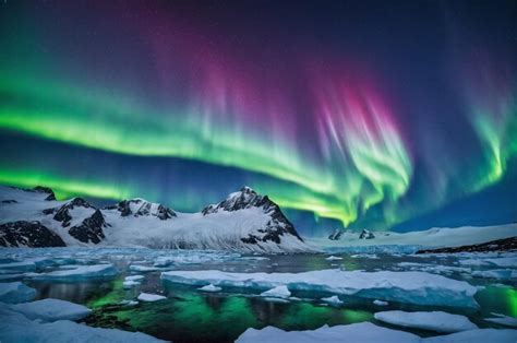 Premium Photo Northern Lights Over Snowy Mountains Aurora Borealis