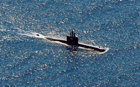 Indonesian navy declares lost sub sunk, as hope fades for its 53 crew ...