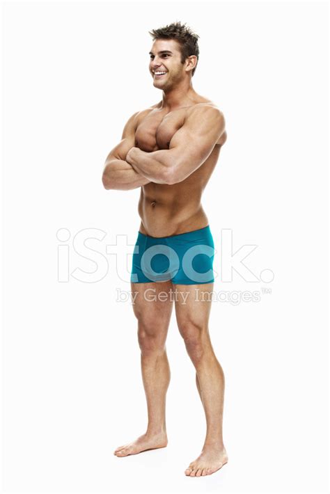 Cheerful Muscular Man Standing With Arms Crossed Stock Photo Royalty