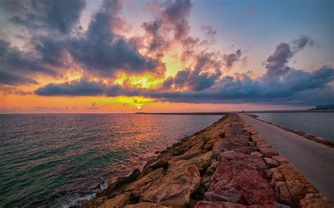 Download wallpaper 3840x2400 sea, sunset, horizon, stones, road 4k ...