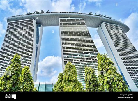 A Low Angle Shot Of The Marina Bay Sands Hotel In Singapore Under A