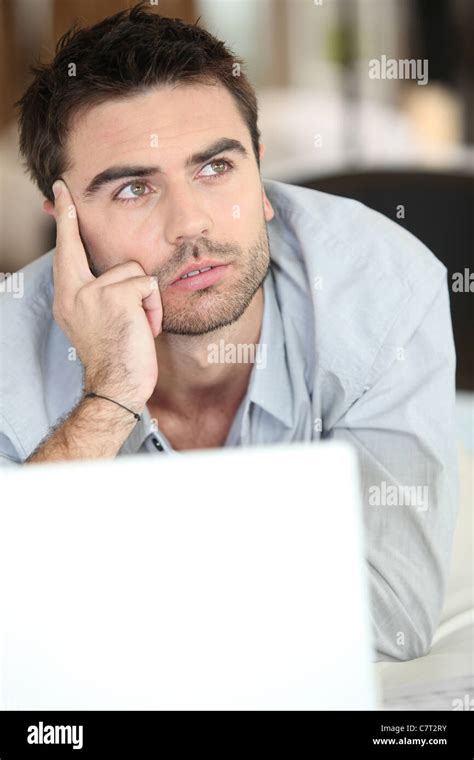 Young Man Thinking Stock Photo Alamy