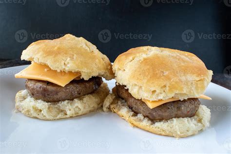 two homemade breakfast sausage biscuits on plate 7990518 Stock Photo at ...