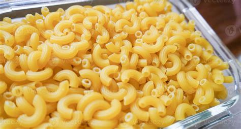 Uncooked Elbow Macaroni Pasta Background Stock Photo At Vecteezy