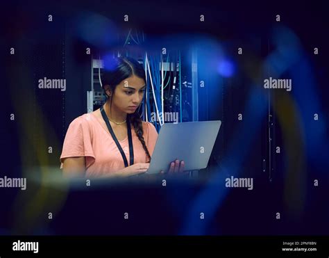 Female Technician Using Laptop In Server Room Stock Photo Alamy