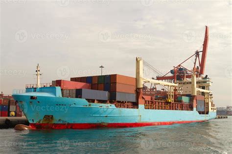 Container Ship in port 11148203 Stock Photo at Vecteezy