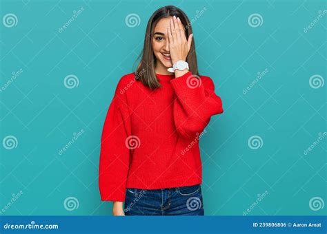 Beautiful Brunette Woman Wearing Casual Winter Sweater Covering One Eye