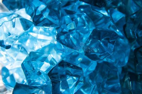 Bright Blue Crystals Made Of Glass Look Like Gems Close Up In The Blur