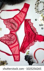 Womans Sexual Red Lingerie Necklace On Stock Photo