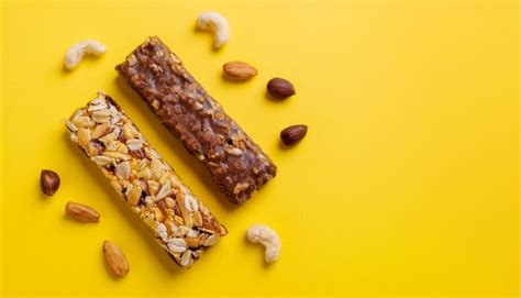 Energy Protein Bars With Nuts Or Chocolate Bars Sweet Food Tasty Snack Yellow Backdrop Top View