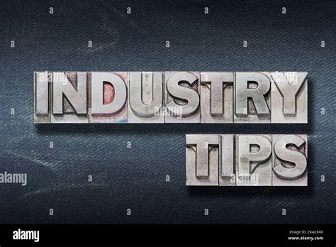 Industry Tips Phrase Made From Metallic Letterpress On Dark Jeans